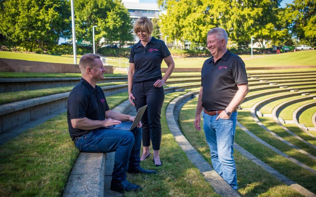 The Cantech Team chatting in the park